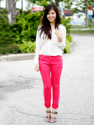 coral jeans with a white button down shirt
