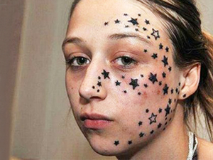 bad tattoos stars on face
