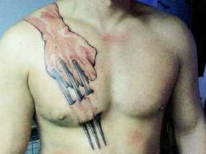 bad tattoos claws chest