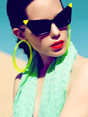 hoop earrings and neon sunglasses