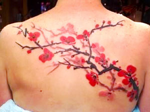 cherry blossom watercolor tattoo