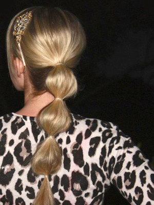 Long, straight ponytail with multiple elastics