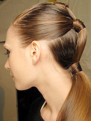 three connected ponytails